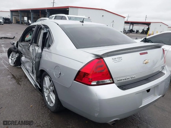 2015 Chevrolet Impala Limited LTZ with VIN 2G1WC5E33F1106563, listed as a IAAI auction lot 38069508 with 171,286 mi miles. Bid and sale history available at carsss.com. Image 3.