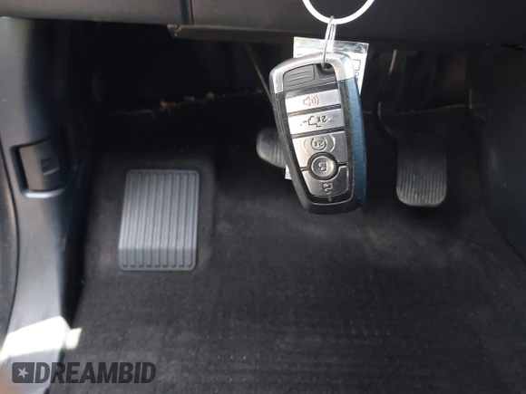 2021 Ford F-150 XL with VIN 1FTFW1E85MFB91107, listed as a IAAI auction lot 42201150 with 116,116 mi miles and . Bid and sale history available at DreamBid. Image 11.