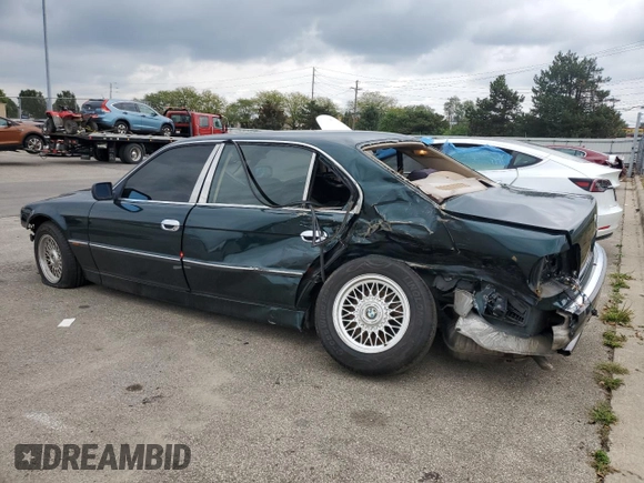 1998 BMW 7 Series 740il with VIN WBAGJ8329WDM24296, listed as a Copart auction lot 73581634 with 247,498 mi miles and Salvage Title. Bid and sale history available at carsss.com. Image 2.