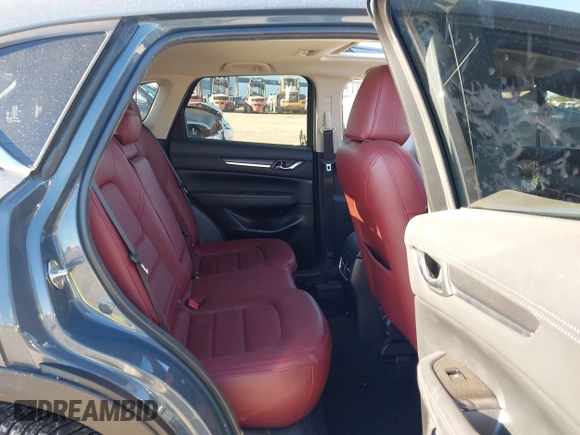 2021 Mazda CX-5 Touring with VIN JM3KFACM1M0371354, listed as a IAAI auction lot 40938490 with 56,172 mi miles. Bid and sale history available at carsss.com. Image 8.