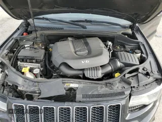 2014 Jeep Grand Cherokee Overland with VIN 1C4RJFCG5EC373508, listed as a Copart auction lot 52645295 with 166,474 mi miles and Salvage Title. Bid and sale history available at carsss.com. Image 13.