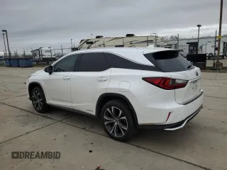 2018 Lexus RX with VIN JTJDGKCA2J2002736, listed as a Copart auction lot 86451614 with 129,918 mi miles and Salvage Title. Bid and sale history available at carsss.com. Image 2.