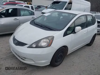 2013 Honda Fit with VIN JHMGE8H30DC067178, listed as a IAAI auction lot 41498926 with 121,036 mi miles. Bid and sale history available at carsss.com. Image 2.