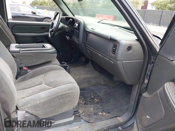 2004 Chevrolet Silverado 1500 LS with VIN 2GCEC19V241233129, listed as a IAAI auction lot 42068152 with 220,636 mi miles and . Bid and sale history available at DreamBid. Image 5.