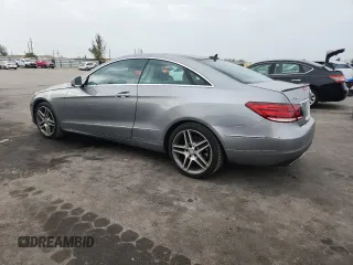 2014 Mercedes-Benz E 350 with VIN WDDKJ5KB5EF276363, listed as a Copart auction lot 61951425 with 71,154 mi miles and Salvage title. Bid and sale history available at DreamBid. Image 2.