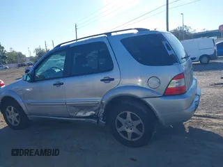 2003 Mercedes-Benz M-Class 3.2L with VIN 4JGAB54E03A383496, listed as a IAAI auction lot 41327756 with 162,973 mi miles. Bid and sale history available at carsss.com. Image 14.