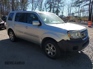 2010 Honda Pilot Touring with VIN 5FNYF4H91AB020868, listed as a IAAI auction lot 41783104 with 298,022 mi miles and . Bid and sale history available at carsss.com. Image 1.