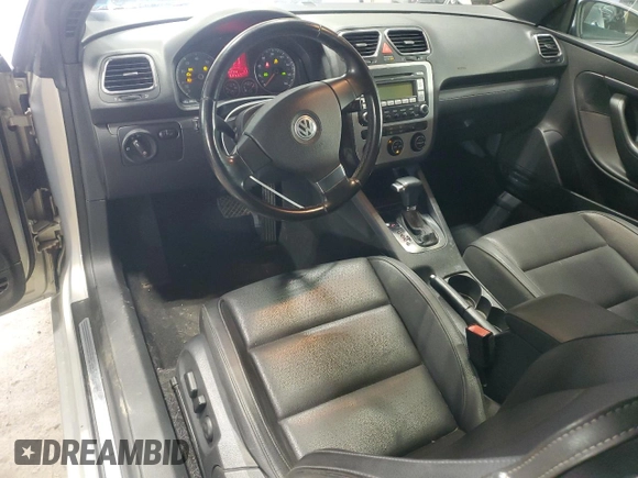 2009 Volkswagen Eos Komfort with VIN WVWBA71F69V019864, listed as a Copart auction lot 52378095 with 142,774 mi miles and Salvage Title. Bid and sale history available at DreamBid. Image 8.