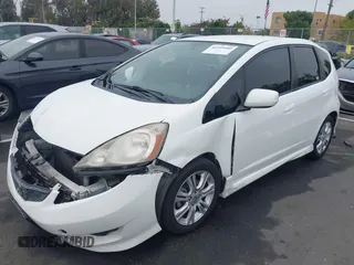 2010 Honda Fit Sport with VIN JHMGE8H43AC031411, listed as a IAAI auction lot 42599400 with 218,730 mi miles and . Bid and sale history available at DreamBid. Image 2.