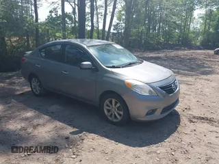 2014 Nissan Versa SV with VIN 3N1CN7AP2EL851670, listed as a IAAI auction lot 42167654 with 112,277 mi miles. Bid and sale history available at carsss.com. Image 1.