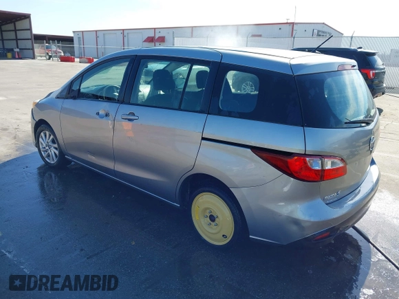 2013 Mazda 5 Sport with VIN JM1CW2BL6D0146696, listed as a IAAI auction lot 41657255 with 142,939 mi miles and . Bid and sale history available at DreamBid. Image 3.