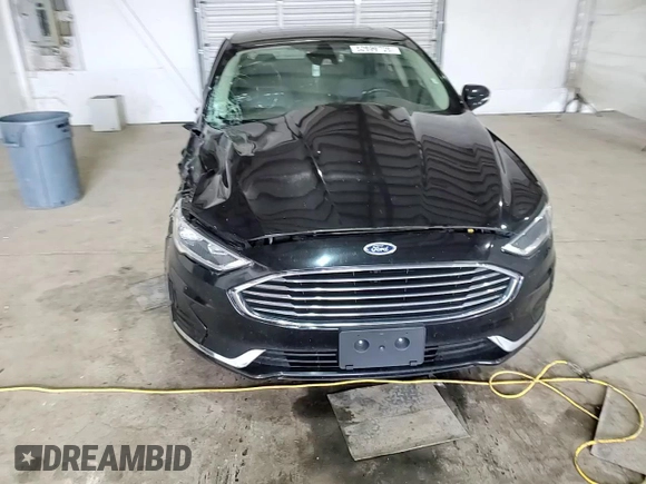 2020 Ford Fusion SEL z VIN 3FA6P0CD3LR117683, wystawiony jako Copart lot #52699725 z przebiegiem 115 248 mil mil oraz Szkoda całkowita • Salvage title. Historia ofert i sprzedaży dostępna na DreamBid. Obrazek 11.