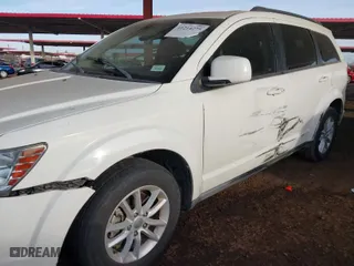 2013 Dodge Journey SXT with VIN 3C4PDCBG0DT701676, listed as a IAAI auction lot 41214275 with 144,196 mi miles. Bid and sale history available at carsss.com. Image 6.