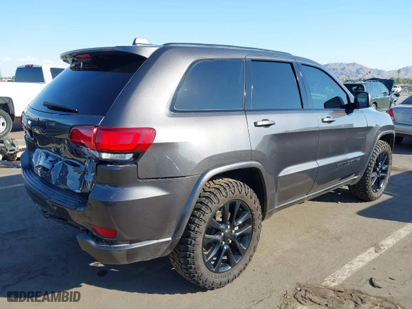2021 Jeep Grand Cherokee Laredo X with VIN 1C4RJEAG2MC785610, listed as a IAAI auction lot 40578955 with 58,213 mi miles. Bid and sale history available at carsss.com. Image 4.