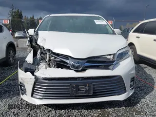 2018 Toyota Sienna XLE with VIN 5TDDZ3DC6JS199051, listed as a IAAI auction lot 41945587 with 58,818 mi miles and . Bid and sale history available at DreamBid. Image 12.