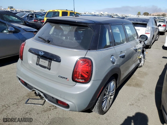 2019 MINI Hardtop 4 Door Cooper S with VIN WMWXU3C57K2H55262, listed as a Copart auction lot 62574144 with 13,620 mi miles and Salvage Title. Bid and sale history available at carsss.com. Image 3.