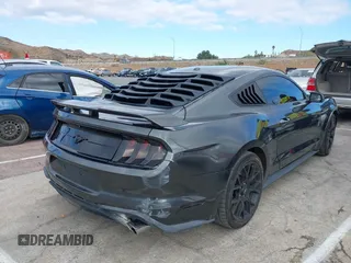 2018 Ford Mustang EcoBoost z VIN 1FA6P8THXJ5154523, wystawiony jako IAAI lot #41523923 z przebiegiem 94 330 mil mil oraz . Historia ofert i sprzedaży dostępna na DreamBid. Obrazek 4.