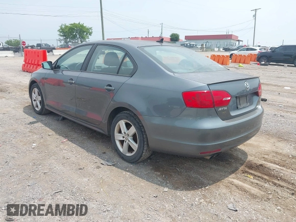 2012 Volkswagen Jetta TDI w/Premium & Nav with VIN 3VWLL7AJ7CM120526, listed as a IAAI auction lot 42494136 with 149,202 mi miles and . Bid and sale history available at DreamBid. Image 3.