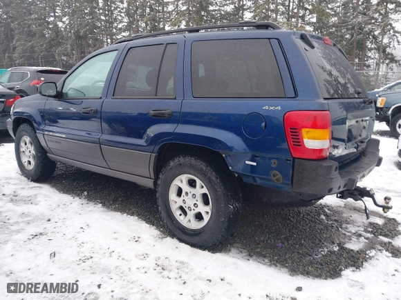 2001 Jeep Grand Cherokee Laredo with VIN 1J4GW48N21C730703, listed as a IAAI auction lot 41581667 with 111,054 mi miles. Bid and sale history available at carsss.com. Image 3.