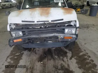 1988 Nissan Hardbody E z VIN 1N6ND16Y3JC351348, wystawiony jako Copart lot #80864914 z przebiegiem 184 397 mil mil oraz Szkody całkowita. Historia ofert i sprzedaży dostępna na DreamBid. Obrazek 12.