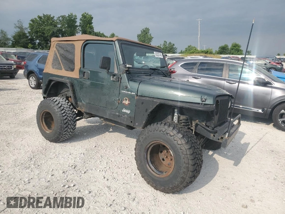 2002 Jeep Wrangler Sahara with VIN 1J4FA59S02P729015, listed as a Copart auction lot 63525745 with Not provided miles and Clean title. Bid and sale history available at DreamBid. Image 4.
