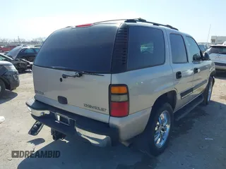 2004 Chevrolet Tahoe LT with VIN 1GNEC13Z84J315648, listed as a IAAI auction lot 41868112 with 198,901 mi miles. Bid and sale history available at carsss.com. Image 4.