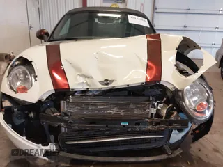 2013 MINI Roadster with VIN WMWSY1C52DT625564, listed as a IAAI auction lot 41442864 with 98,240 mi miles and . Bid and sale history available at DreamBid. Image 13.