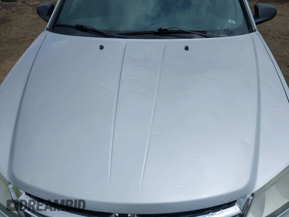 2012 Dodge Avenger SE with VIN 1C3CDZAB3CN324335, listed as a IAAI auction lot 42059158 with 202,417 mi miles. Bid and sale history available at carsss.com. Image 6.