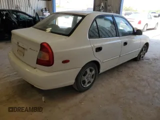 2002 Hyundai Accent GL with VIN KMHCG45C82U380280, listed as a Copart auction lot 79087254 with 173,764 mi miles and Clean Title. Bid and sale history available at carsss.com. Image 3.