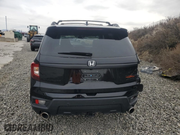 2023 Honda Passport TrailSport with VIN 5FNYF8H63PB010963, listed as a Copart auction lot 43573485 with 18,610 mi miles and Salvage title. Bid and sale history available at DreamBid. Image 6.