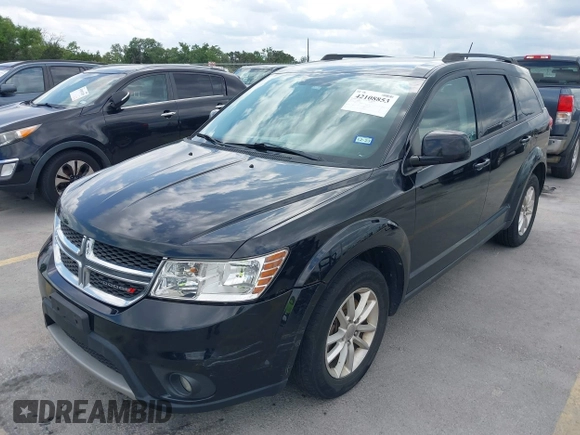 2015 Dodge Journey SXT with VIN 3C4PDCBG5FT604847, listed as a IAAI auction lot 42108853 with 164,679 mi miles. Bid and sale history available at carsss.com. Image 2.