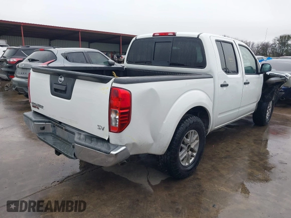 2019 Nissan Frontier S with VIN 1N6AD0ERXKN727732, listed as a IAAI auction lot 41509340 with 141,301 mi miles and . Bid and sale history available at DreamBid. Image 4.