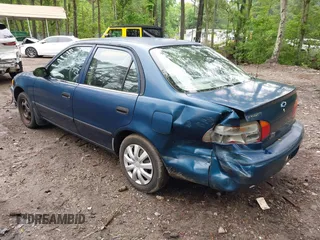 2000 Chevrolet Prizm LSi z VIN 1Y1SK5289YZ401584, wystawiony jako IAAI lot #42263210 z przebiegiem 151 567 mil mil oraz . Historia ofert i sprzedaży dostępna na DreamBid. Obrazek 3.