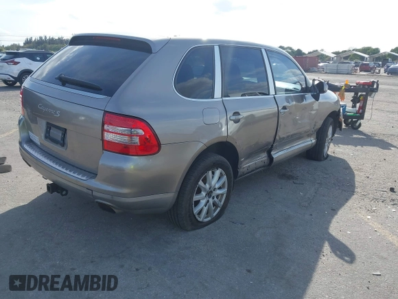 2005 Porsche Cayenne S with VIN WP1AB29P75LA61263, listed as a IAAI auction lot 41635350 with 242,874 mi miles. Bid and sale history available at carsss.com. Image 4.