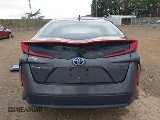2018 Toyota Prius Plus with VIN JTDKARFP6J3078362, listed as a IAAI auction lot 42021835 with 61,170 mi miles and . Bid and sale history available at DreamBid. Image 16.