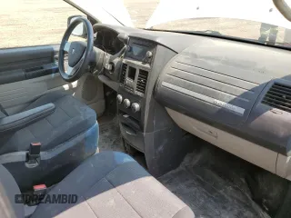 2009 Dodge Grand Caravan with VIN 1D8HN11E99B505784, listed as a Copart auction lot 60590065 with 195,488 mi miles and Salvage title. Bid and sale history available at DreamBid. Image 8.