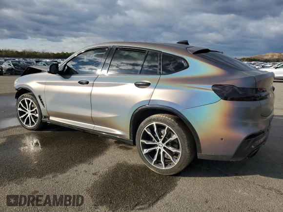 2021 BMW X4 M40i z VIN 5UX2V5C08M9F52562, wystawiony jako Copart lot #83665674 z przebiegiem Nie podano mil oraz Szkoda całkowita • Salvage title. Historia ofert i sprzedaży dostępna na DreamBid. Obrazek 2.