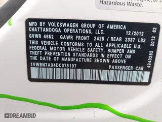 2013 Volkswagen Passat TDI SE with VIN 1VWBN7A34DC075197, listed as a IAAI auction lot 41707346 with 188,685 mi miles. Bid and sale history available at carsss.com. Image 9.
