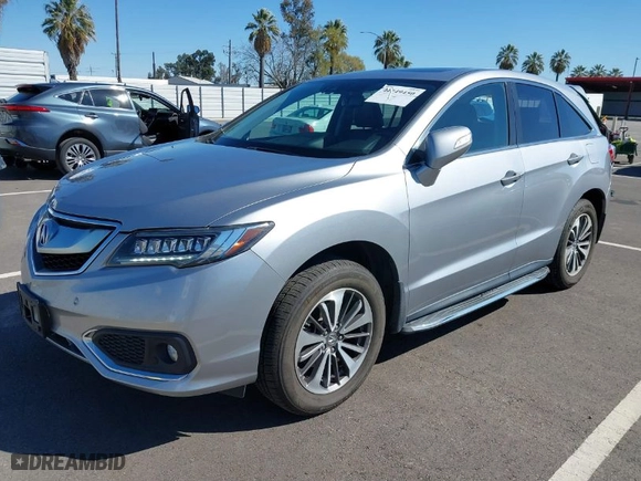 2018 Acura RDX w/Advance Pkg with VIN 5J8TB4H70JL018029, listed as a IAAI auction lot 41749450 with 113,506 mi miles. Bid and sale history available at carsss.com. Image 2.
