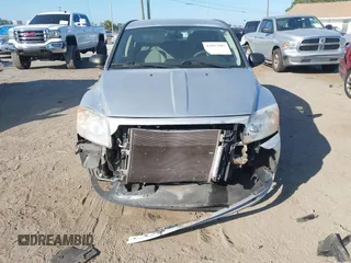 2011 Dodge Caliber Mainstreet with VIN 1B3CB3HA9BD126117, listed as a IAAI auction lot 41897907 with 85,026 mi miles and . Bid and sale history available at DreamBid. Image 6.