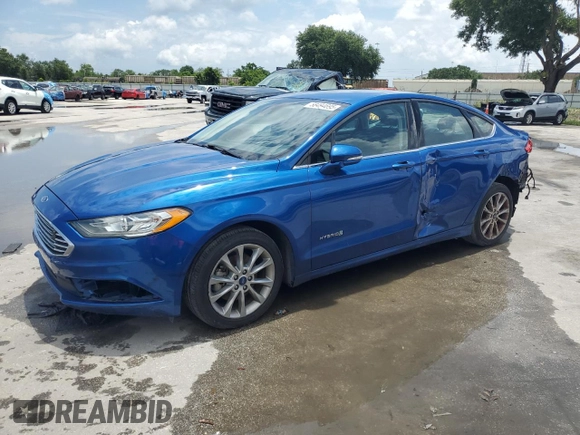 2017 Ford Fusion Hybrid SE z VIN 3FA6P0LU6HR319103, wystawiony jako Copart lot #58494695 z przebiegiem 104 483 mil mil oraz Szkoda całkowita • Salvage title. Historia ofert i sprzedaży dostępna na DreamBid. Obrazek 1.