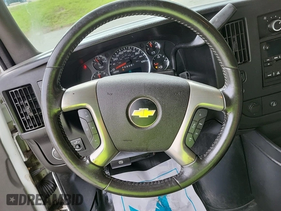 2015 Chevrolet Express Cargo with VIN 1GCWGFCF2F1163079, listed as a IAAI auction lot 42832363 with 183,774 mi miles and . Bid and sale history available at DreamBid. Image 53.