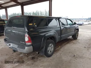 2015 Toyota Tacoma with VIN 3TMMU4FN1FM086408, listed as a IAAI auction lot 41320197 with 161,356 mi miles and . Bid and sale history available at DreamBid. Image 4.