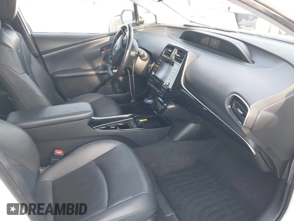 2021 Toyota Prius L Eco z VIN JTDKAMFU9M3131228, wystawiony jako IAAI lot #41257117 z przebiegiem 72 840 mil mil oraz . Historia ofert i sprzedaży dostępna na DreamBid. Obrazek 5.