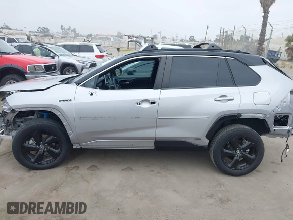 2021 Toyota RAV4 Hybrid XSE z VIN 4T3E6RFV9MU027713, wystawiony jako IAAI lot #42587759 z przebiegiem 28 806 mil mil oraz . Historia ofert i sprzedaży dostępna na DreamBid. Obrazek 18.