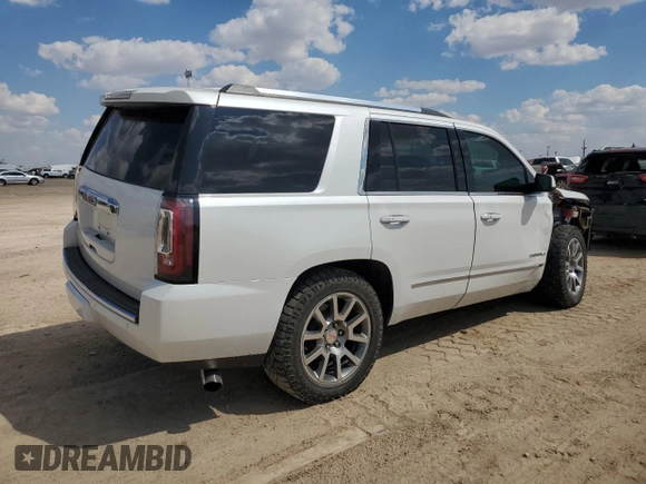 2016 GMC Yukon Denali with VIN 1GKS2CKJ5GR282446, listed as a Copart auction lot 68660254 with 122,751 mi miles and Salvage Title. Bid and sale history available at carsss.com. Image 3.