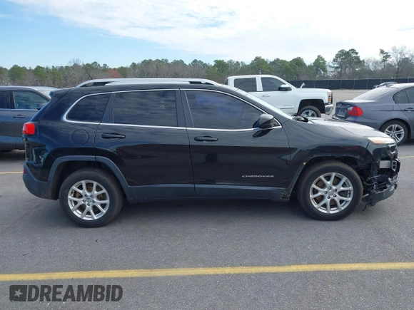 2014 Jeep Cherokee Latitude with VIN 1C4PJLCB0EW288309, listed as a IAAI auction lot 41624746 with 164,037 mi miles and . Bid and sale history available at DreamBid. Image 13.