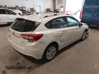 2017 Subaru Impreza Premium with VIN 4S3GTAD61H3727314, listed as a IAAI auction lot 42316108 with 111,215 mi miles and . Bid and sale history available at DreamBid. Image 4.