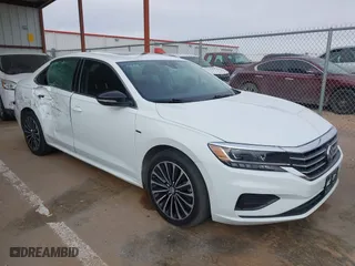 2022 Volkswagen Passat 2.0T Limited Edition with VIN 1VWBA7A32NC006523, listed as a IAAI auction lot 41263642 with 52,578 mi miles. Bid and sale history available at carsss.com. Image 1.
