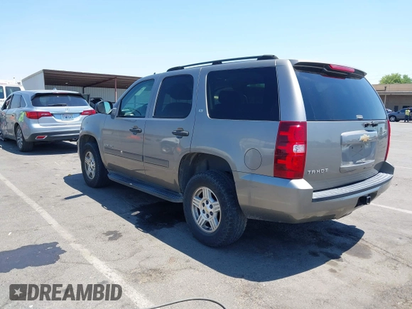 2007 Chevrolet Tahoe LT with VIN 1GNFC13J87R242057, listed as a IAAI auction lot 42736911 with 162,569 mi miles and . Bid and sale history available at DreamBid. Image 3.